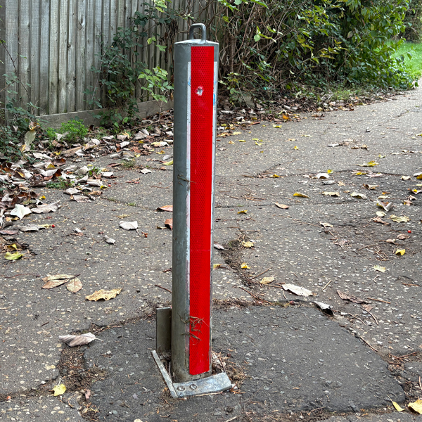 Bollards Dig In red pathway stopping vehicles Bollard Supplies